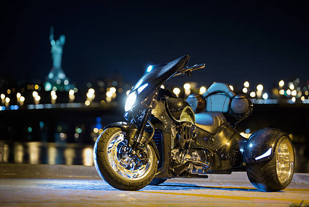 istock Black trike standing on the night street 473100284