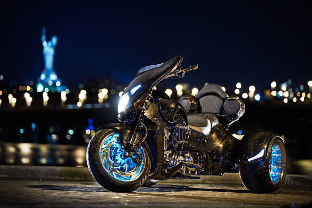 istock Black trike standing on the night street 473100286