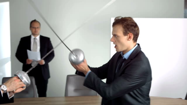HD Super Slow-Mo: Businessmen Competing With Fencing Foils
