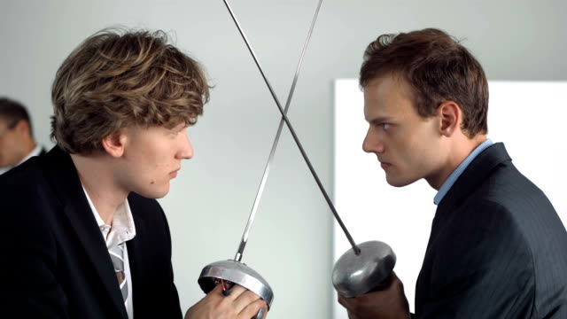 HD Super Slow-Mo: Businessmen Facing Off With Fencing Foils