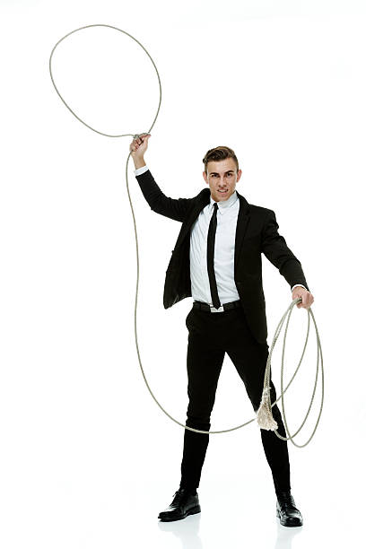 istock Angry businessman lassoing 473105138
