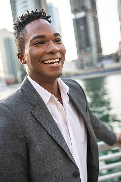 istock Elegant man on Dubai marina promenade 473118012