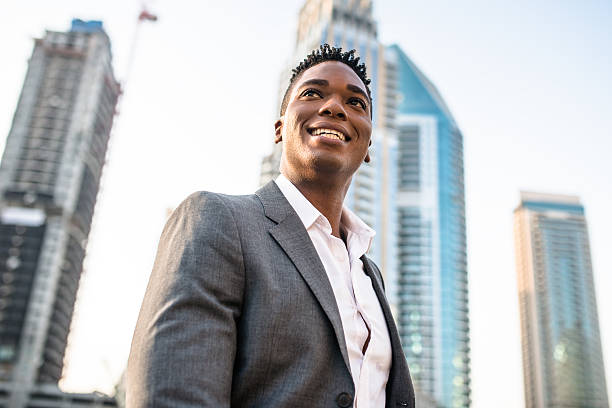 istock Elegant man on Dubai marina promenade 473118016