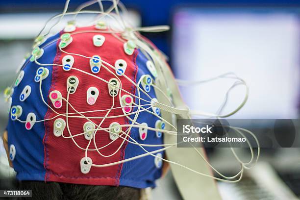 Woman With Eeg And Eog Electrodes In Laboratory Stock Photo - Download Image Now - 2015, Adult, Black Hair