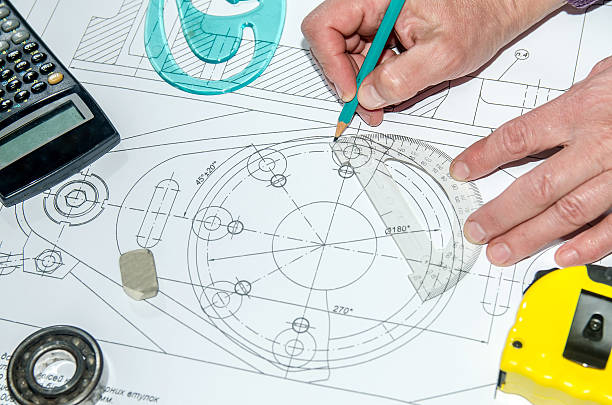 istock engineering drawings with hands drawing  project by pencil on paper 473118374