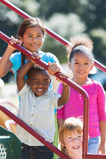 istock Multi-ethnic children on a sunny playground 473126340