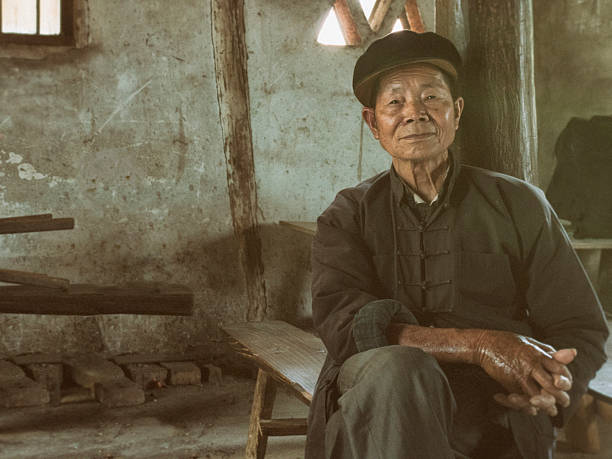 istock Old Chinese man in traditional clothing 473127284