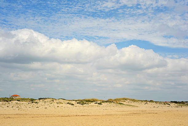 istock Spanish landscape with sand and sky with clouds 473134348
