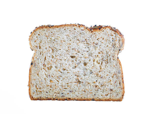 istock Fresh slice of bread isolated on white 473137156