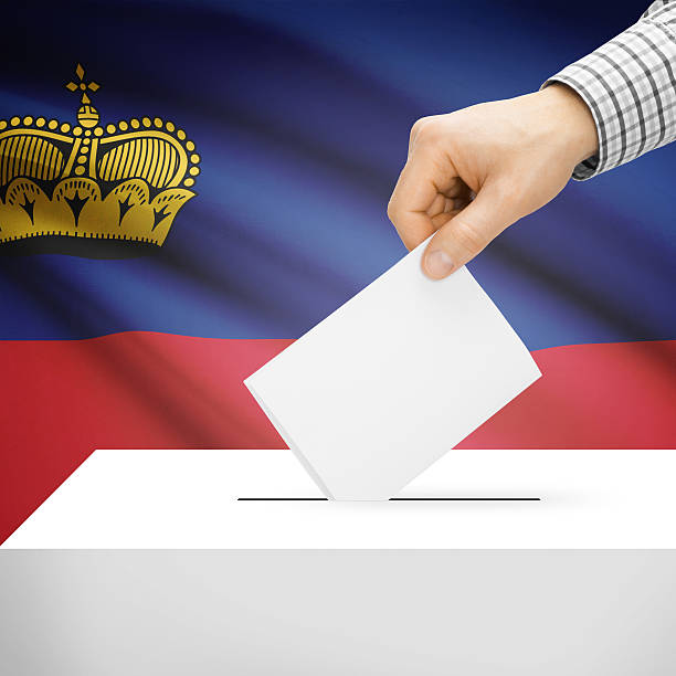 istock Ballot box with national flag on background - Liechtenstein 473138376
