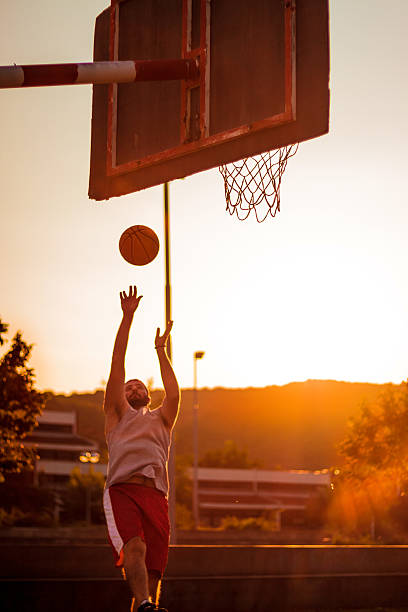 istock Street basketball at sunset 473138584