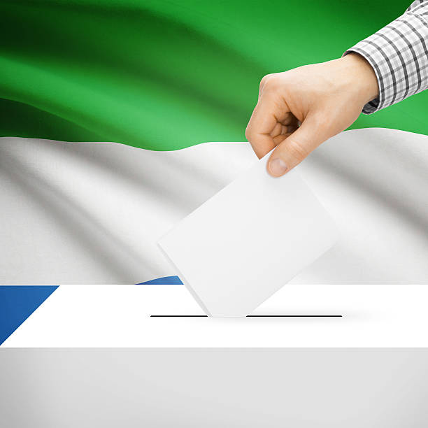 istock Ballot box with national flag on background - Sierra Leone 473141674