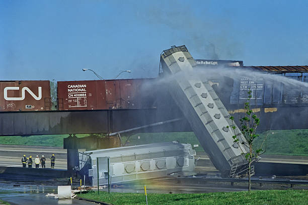 Train Derailment, May 22 1995 Warren, MI, USA – May 22, 1995.  Train derailment onto the I-696 interstate highway. derail stock pictures, royalty-free photos & images