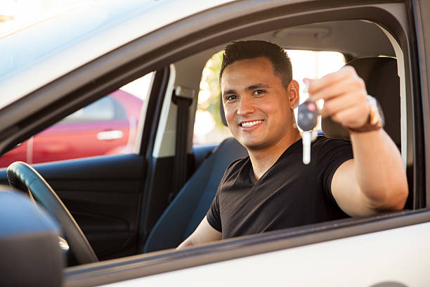 istock Young man with a brand new car 473146300