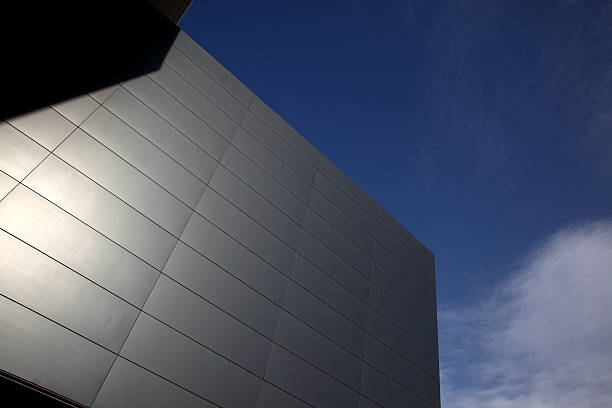 istock Business glass building and blue sky background 473146632