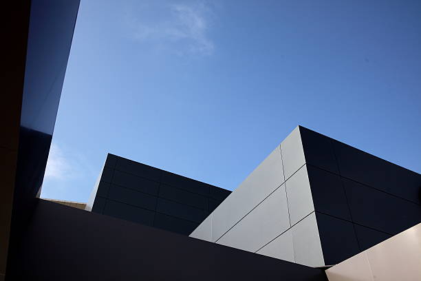 istock Business glass building and blue sky background 473147248