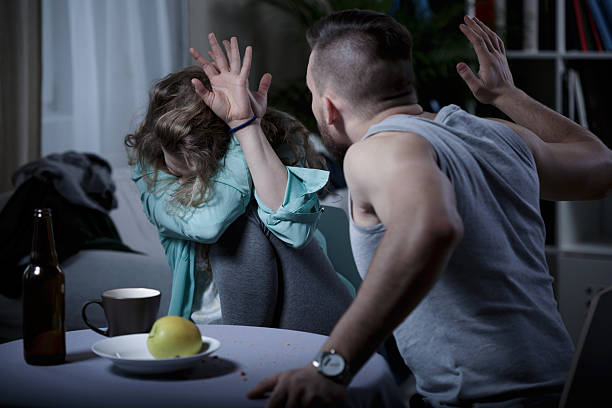 Man beating wife Yelling aggressive man beating his scared wife aggression stock pictures, royalty-free photos & images