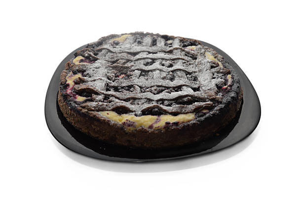 istock Beautiful cake made with hands of currants, cherries and cheese 473148638