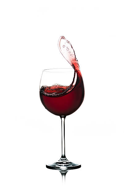 istock Red Wine Splashing In A Glass 473149568