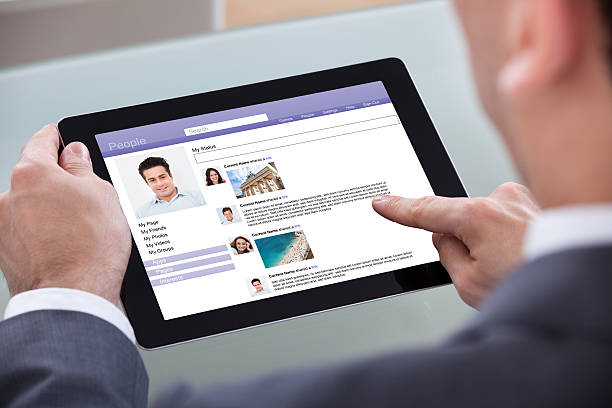 istock Close-up Of Man Browsing On Digital Tablet 473152938