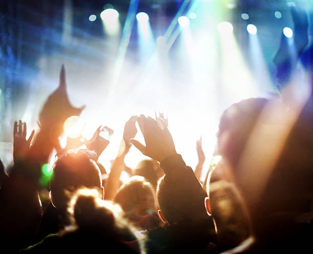 istock Large crowd at music concert. 473153282