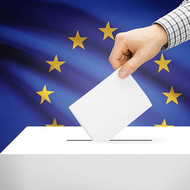 istock Ballot box with national flag on background - EU 473155726