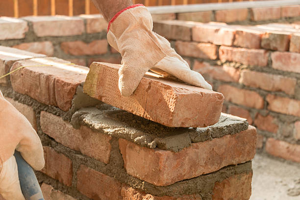 bricklaying - protective workwear bricklayer manual worker construction imagens e fotografias de stock