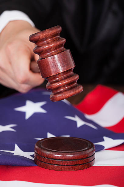 istock Male Judge Striking The Gavel 473156334