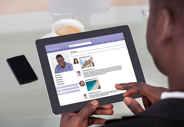 istock Businessman Chatting On Social Networking Sites 473156512