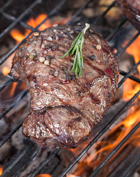 istock Beef steak on garden grill 473157124