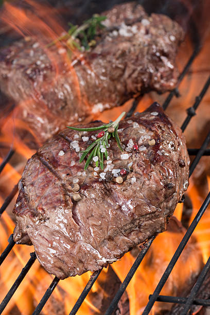 istock Beef steak on garden grill 473157134