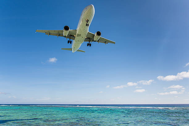 istock Watching landing airplanes in the jetblast area on Rarotonga 473157426