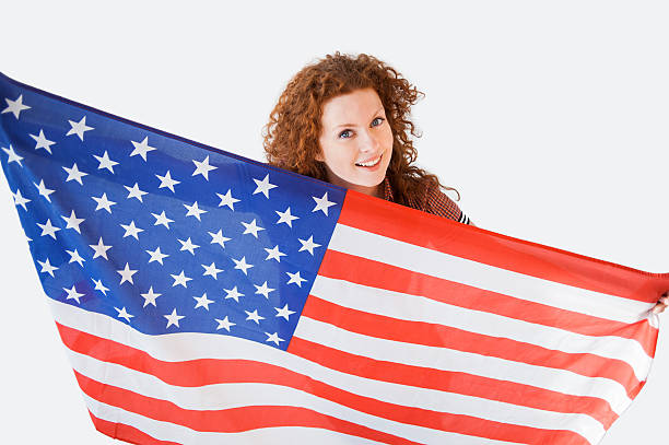 istock Cute girl with American flag 473158194