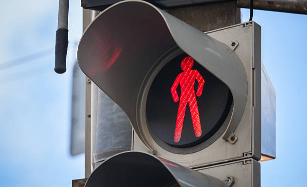 istock Modern pedestrian traffic lights with red signal 473159114