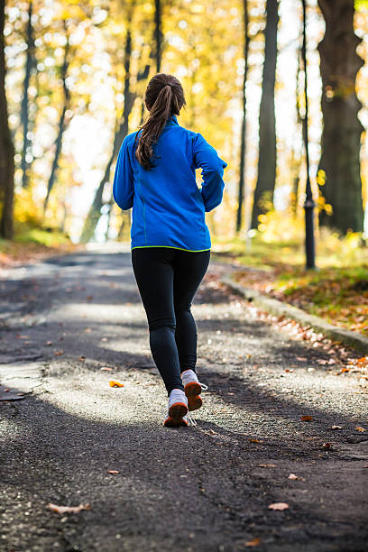 istock Young woman running outdoor 473159794