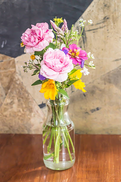 istock Glass vase with beautiful flowers 473163590