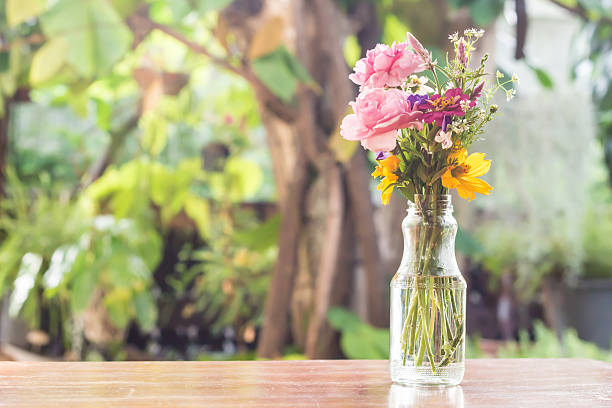 istock Glass vase with beautiful flowers 473163610