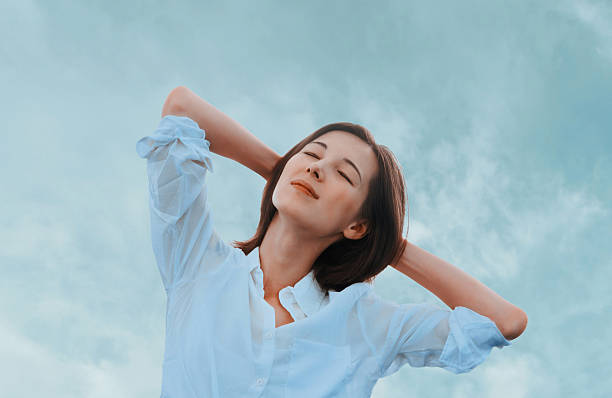 istock Young woman enjoying a nice day 473165898