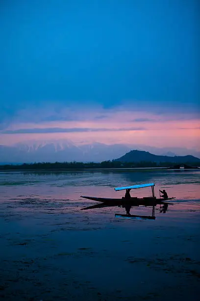 Sunset over the Dal Lake in Kashmir, India in winter time