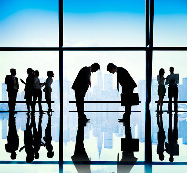 istock Japanese Business People Bowing Down Office Concept 473167112