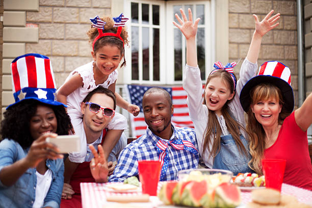 istock Two families happily celebrating Independence Day 473167992