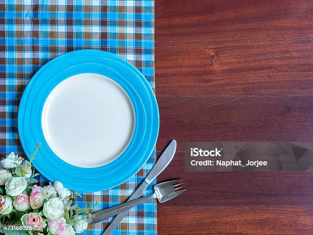 Blank Plate With Checked Tablecloth On Wooden Table Background Stock Photo - Download Image Now