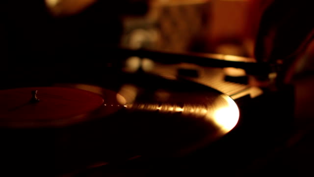Record spinning on portable turntable.Selective Focus.