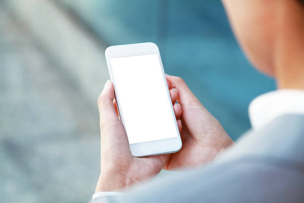 istock Business people hand holding blank screen smart phone 473173964