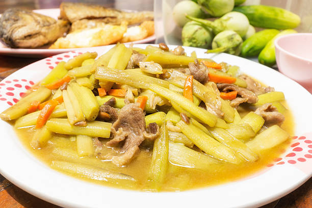 istock Stir-fire lotus stem with pork. 473179246