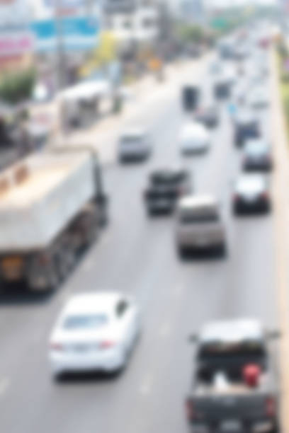 istock Blurred of car on road 473184162