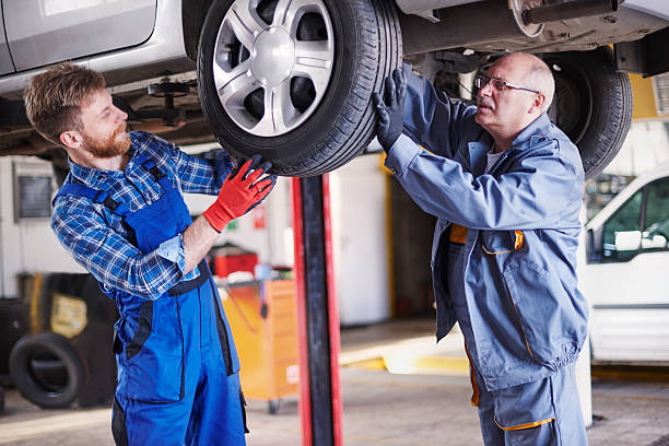 istock Changing the tire let's leave for professionals 473185366