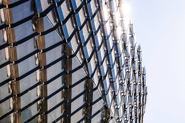 Friends Arena - Architectural details and structures in Stockholm Stockholm, Sweden - April 26, 2015: Friends Arena, Sweden's national stadium for football, is a retractable roof multi-purpose stadium located just north of Stockholm City Centre. Architectural details of the building exterior structure. architecture textured effect architectural feature business stock pictures, royalty-free photos & images