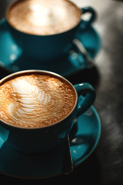 istock Two cups of coffee with cream 473189724