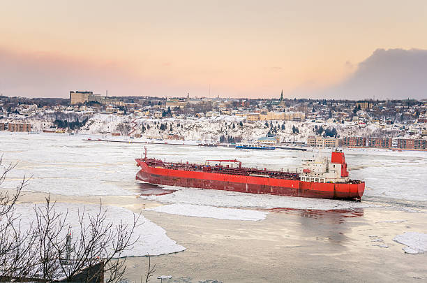 istock Cargo Ship on Saint Lawrence River in Winter 473189764
